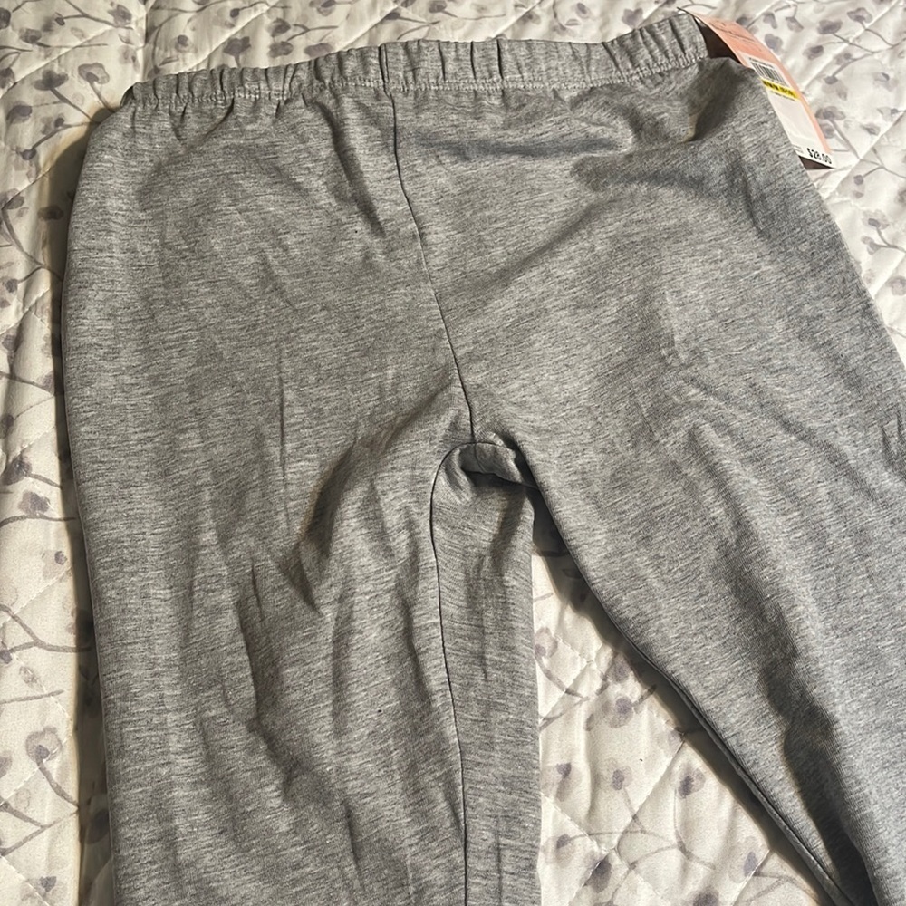 NWT kid’s Juicy Couture leggings M